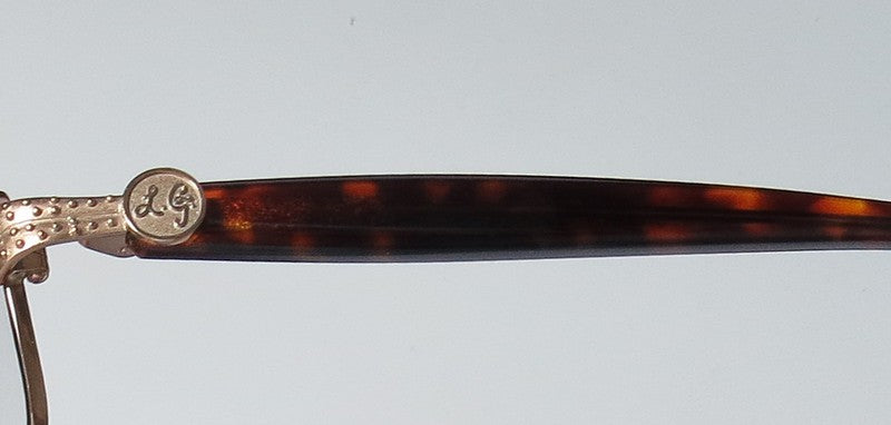 Color_brownish gold / dark tortoise